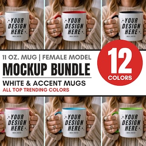 Könnte beinhalten: Ein Mockup-Paket mit 12 verschiedenen farbigen 11-Unzen-Bechern mit weißem Boden und farbigem Akzentrand. Die Becher zeigen den Text "YOUR DESIGN HERE" in Schwarz. Die Becher werden von einer Person in einem weißen Pullover gehalten.