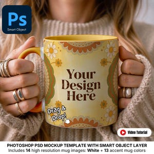 May include: A yellow mug with a floral pattern and the text "Your Design Here". The mug has a yellow handle and is held by a person wearing rings. The image includes the text "Drag & Drop!" and a "Video Tutorial" button.