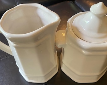 Vintage Pfaltzgraff Stoneware Heritage White pattern 6” x 5” sugar bowl with lid and 5” x 5” creamer pitcher with a multi side panel design!