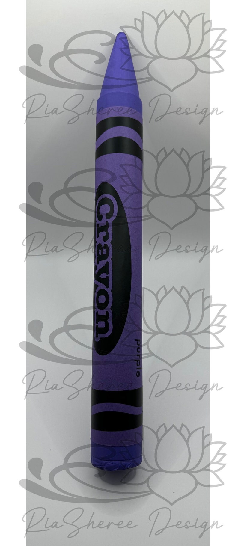 A purple fake crayon with black lettering that reads 'Crayon' and 'purple'.
