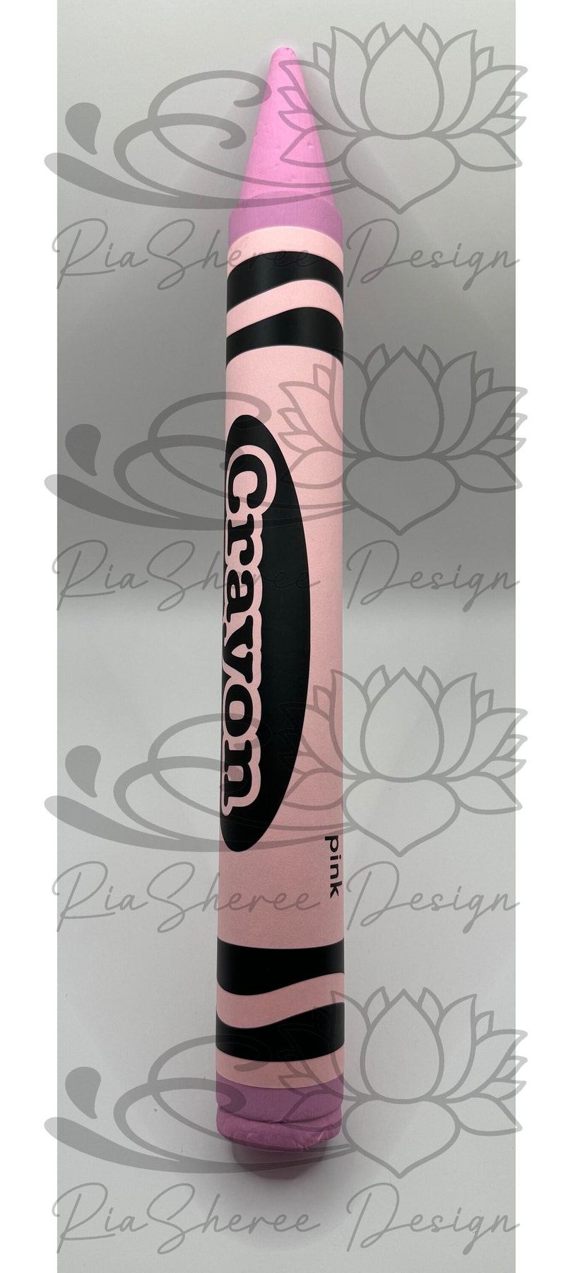 A pink crayon with black stripes and the word 'Crayon' in black lettering. The crayon has the word 'pink' written on the side.