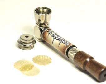 May include: A silver metal smoking pipe with a wooden mouthpiece and a barbed wire design. The pipe comes with a screen and a bowl.