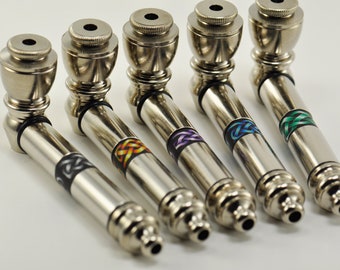 May include: Five silver metal pipes with different coloured Celtic knot designs on the side.