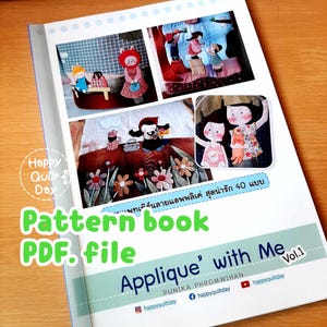 May include: A colourful book cover with the title "Applique' with Me Vol. 1" and a picture of a girl wearing a red hooded jacket and carrying a basket of flowers. The book is a pattern book for applique projects and includes 40 different designs.