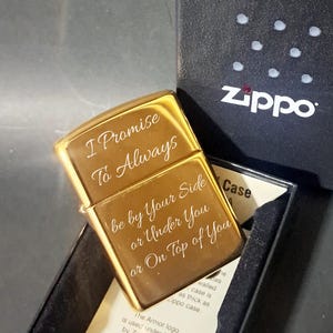 May include: Gold-plated Zippo lighter with an engraved message: "I Promise To Always Be By Your Side Or Under You Or On Top Of You".