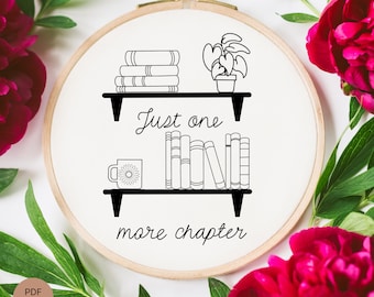 May include: Black and white embroidery hoop design featuring a bookshelf with books, a potted plant, a mug, and the text "Just one more chapter".