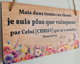Light wooden board with Christian message in French MORE THAN VINQUER Biblical verse on physical support to offer as a gift Romans 8:37