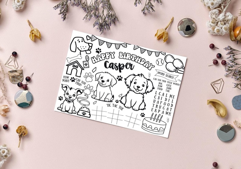 K&ouml;nnte beinhalten: Ein schwarz-wei&szlig;es, druckbares Aktivit&auml;tsblatt f&uuml;r eine Geburtstagsfeier. Das Blatt zeigt ein Hunde-Design mit einem Wortsuchspiel, einem Tic-Tac-Toe-Spiel und einem Banner "Happy Birthday Casper".