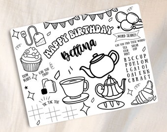May include: A black and white printable birthday activity sheet with a word search, tic-tac-toe game, and other fun activities. The sheet features a teapot, teacups, cupcakes, and other tea party-themed illustrations. The text on the sheet reads "Happy Birthday Bettina".