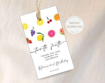 May include: A white thank you tag with a colorful fruit design. The text reads "two-tti frutti" and "Thank you for coming to celebrate Olivia's 2nd Birthday 03.27.2025".