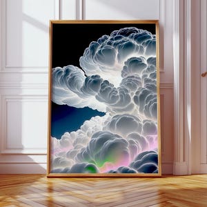 May include: A framed art print featuring a digital rendering of billowing, luminous clouds. The artwork showcases a gradient of colors, from deep blues and blacks to bright whites and hints of pink and green, creating a dramatic and ethereal effect.