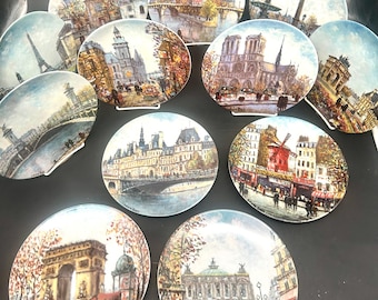Limoges Porcelain 12 Collectible Plates with Sights of Paris by Louis Dali, France, 1980s
