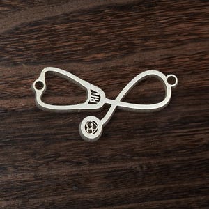 RN-stetoskop i sterlingsilver med koppling