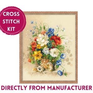May include: Cross stitch kit depicting a colourful floral arrangement in a vase with seashells. The flowers include white, red, blue, yellow, and orange blooms. The vase is brown with a decorative design. The background is a light beige.
