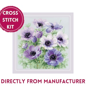 May include: Cross stitch kit featuring a bouquet of purple and white anemones with green foliage. The kit includes all the materials needed to complete the project.