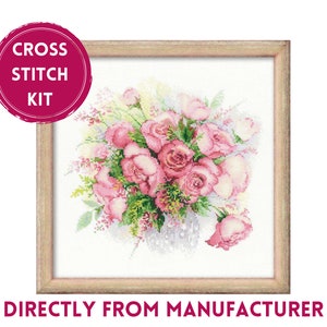 May include: Cross stitch kit featuring a bouquet of pink roses in a vase. The roses are surrounded by green leaves and white flowers. The kit includes all the materials needed to complete the project.