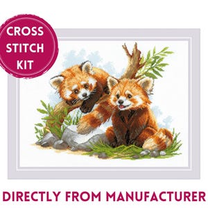 May include: Cross stitch kit featuring two red pandas in a forest setting. The pandas are sitting on a rock and a branch, with green leaves and a blue sky in the background. The kit includes all the materials needed to complete the project.