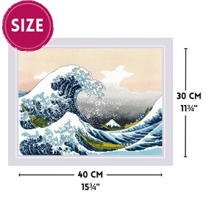 The RIOLIS cross stitch kit The Great Wave off Kanagawa after K. Hokusai Artwork features a detailed design using 17 colors of Anchor stranded cotton threads. The kit includes a needle, Zweigart 14ct white AIDA fabric, and a color chart.