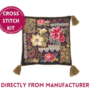 May include: Cross stitch kit featuring a floral design with red, pink, yellow, and green flowers on a black background. The kit includes a cushion cover with tassels.