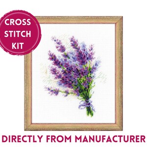 May include: Cross stitch kit featuring a bouquet of purple lavender flowers in a wooden frame. The kit includes all the materials needed to complete the project.