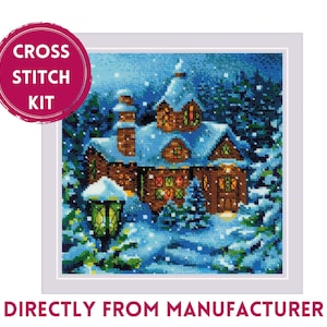 May include: Cross stitch kit featuring a snowy winter scene with a cozy cottage illuminated by warm lights. The kit includes all the materials needed to create a beautiful cross stitch artwork.