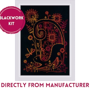 May include: Blackwork embroidery kit featuring a black cat with a curled tail surrounded by sunflowers and other floral designs. The design is outlined in a gradient of orange and yellow thread.