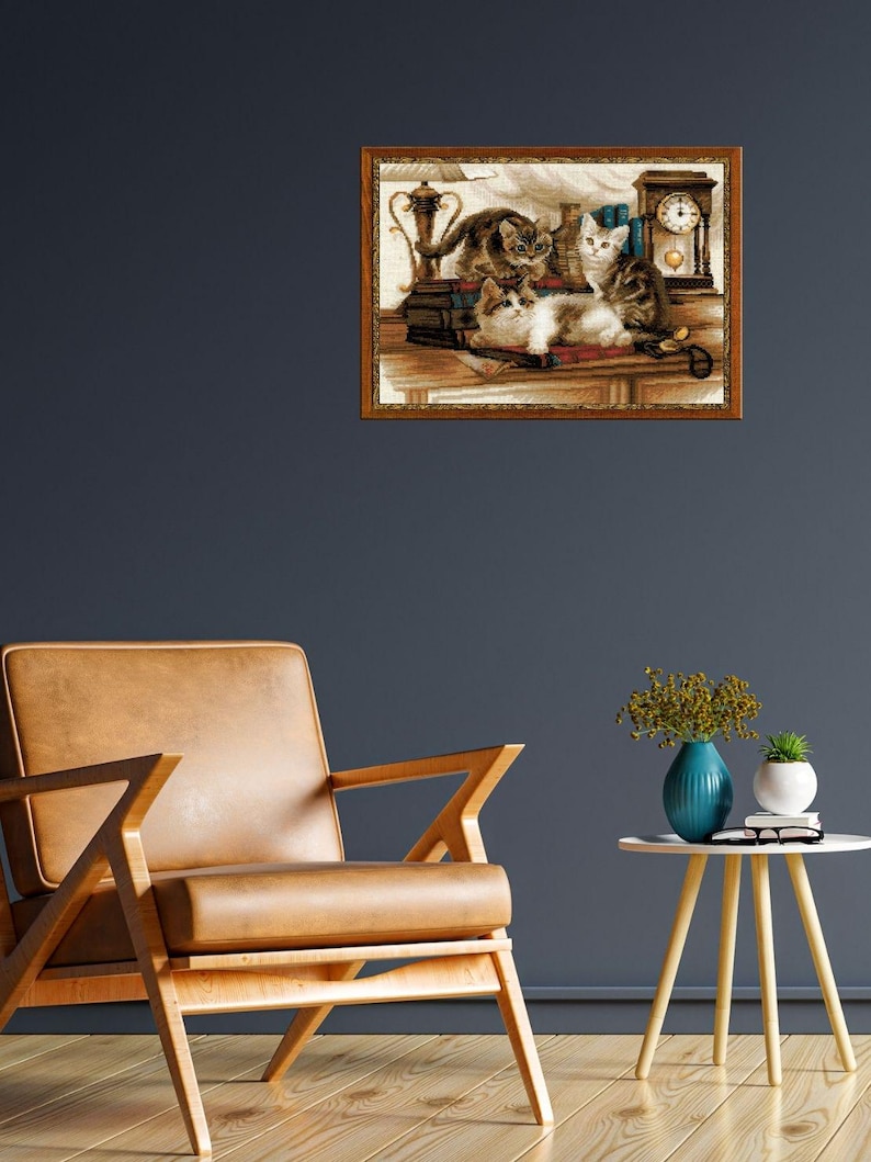 The RIOLIS cross stitch kit Furry Friends features beautiful three kittens playing. The kit includes wool acrylic threads in 20 colors, a needle, Zweigart 14ct flaxen AIDA fabric and a color chart. The finished size is 40x30 cm