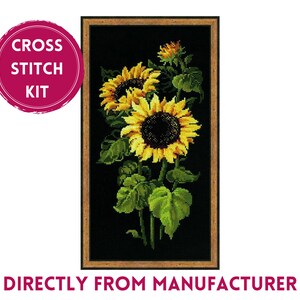 May include: Cross stitch kit featuring a framed image of three sunflowers with yellow petals and dark centers against a black background.