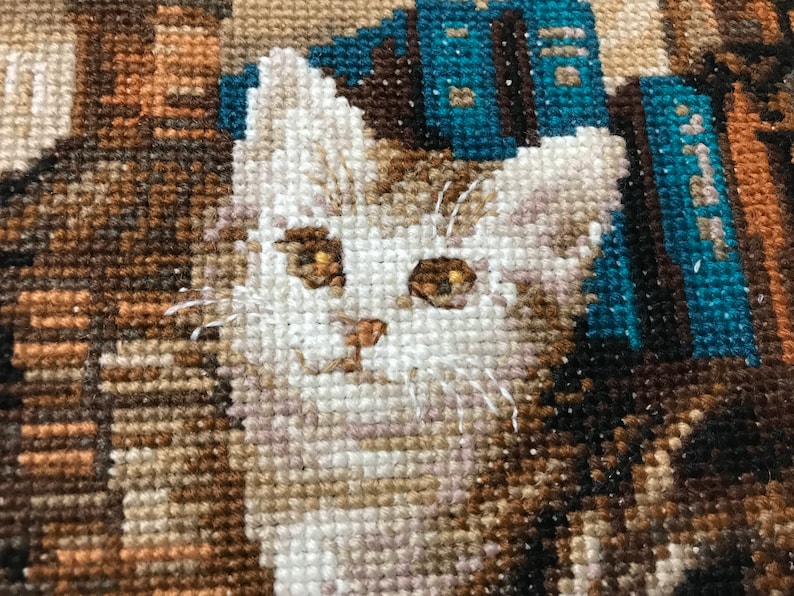 The RIOLIS cross stitch kit Furry Friends features beautiful three kittens playing. The kit includes wool acrylic threads in 20 colors, a needle, Zweigart 14ct flaxen AIDA fabric and a color chart. The finished size is 40x30 cm