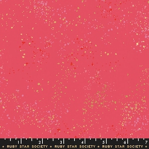 May include: Pink fabric with a speckled pattern of gold, pink, and red dots. The fabric has a subtle sheen and a soft texture.  "RUBY STAR SOCIETY" is printed in black at the bottom of the fabric.
