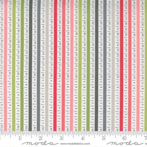 May include: A close-up of a fabric swatch with a repeating pattern of thin vertical stripes in shades of green, gray, pink, and red. The fabric is measured in inches and the text "moda" appears on the ruler.
