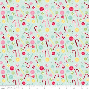 May include: A repeating pattern of colorful candies on a light teal background. The design includes red and white candy canes, pink and red lollipops, yellow and green hard candies, and small colorful sprinkles. The fabric is 12 inches wide.