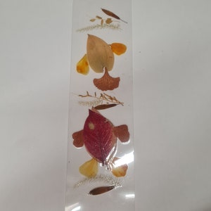 This bookmark is made from naturally pressed flowers, it's look really very beautiful!
It's an ideal gift for books reader!
There are no chemical colours used. Flowers are collected and pressed very carefully. Handmade bookmark.