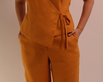 Linen trousers and vest. Orange color. Wide trousers with pockets, asymmetrical vest with a tie on the side. stylish and comfortable.