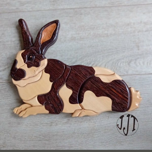 Hand-cut rabbit in Wenge and Basswood. Delicate Intarsia technique, unique piece of art for wall decoration. Meticulous finishing.