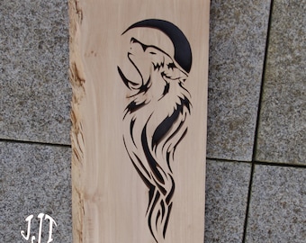 Wolf howling at the moon, hand-cut from local solid wood. An original wooden gift for animal and wilderness lovers.