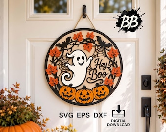May include: A circular wooden door sign featuring a white ghost, three orange jack-o'-lanterns, black bats, spiderwebs, and orange maple leaves. The text "Hey Boo" is displayed in black script. The sign hangs from a rope on a white door.
