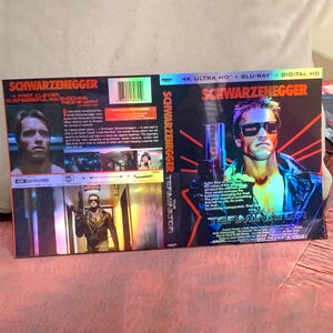 May include: The Terminator Blu-ray case featuring Arnold Schwarzenegger. The cover art displays Schwarzenegger holding a gun, with the film's title and the words "4K Ultra HD + Blu-ray + Digital HD".