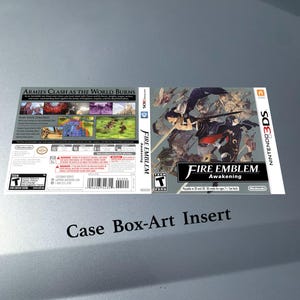 May include: A Nintendo 3DS game case insert for "Fire Emblem: Awakening." The cover art shows a dynamic illustration of characters in action, with the game's title prominently displayed. The back includes game details and a rating.