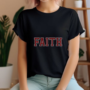 May include: Black t-shirt with the word "FAITH" in red and white rhinestones.