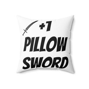 May include: White pillow with black text that reads "#1 Pillow Sword" and a stylized sword graphic.