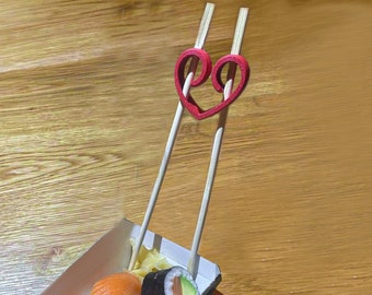 Perfektioniere dein Sushi-Erlebnis mit dem Chopstick/Essstäbchen-Helfer in Herzform!