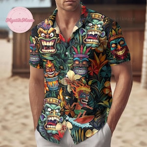 May include: A black button-up shirt with a colorful tropical print featuring tiki masks, flowers, and palm leaves. The shirt has short sleeves and a button-up collar.