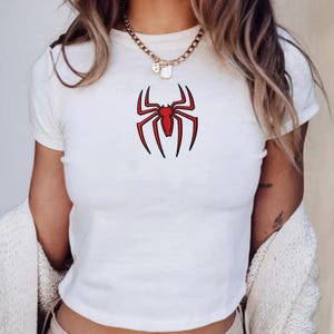 Embroidered Spiderman Brand New 2026 Baby Tee, Spider logo Baby Tee, Super Hero Avenger Matching Tee, WDW Trip Matching Vacation Top