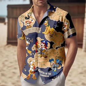 May include: Navy blue button-down shirt featuring a map design with Disney characters in pirate attire. The shirt includes the text "YO HO YO HO A PIRATES LIFE FOR ME" and "PIRATES OF THE CARIBBEAN".