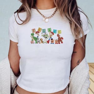 Retro Toy Story 5 Embroidered Baby Tee, Woody Buzz Jessie Rex Tee, Vintage Toy Story Friends Top, 2026 Disney Pixar Fest Family Trip