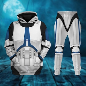 May include: A white and blue hooded sweatshirt and matching sweatpants set. The design mimics the armor of a clone trooper, with detailed panels and accents. The outfit is primarily white with blue and black detailing.