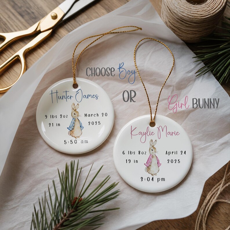 Ceramic baby boy ornament featuring blue bunny illustration