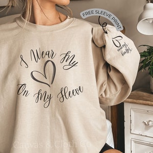 I Wear My Heart On My Sleeve Sweat shirt and Hoodie, Personalized, Custom Mama Sweatshirt with Children Name, Christmas Gift For Mom