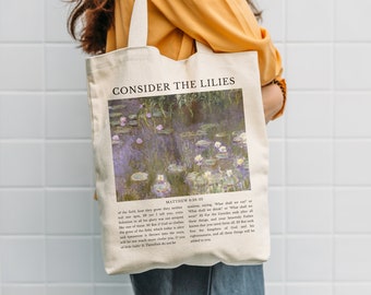 Könnte beinhalten: Eine weiße Canvas-Tragetasche mit einem Druck eines Seerosenbildes und dem Text "CONSIDER THE LILIES" sowie einem Bibelvers aus Matthäus 6:28-33.